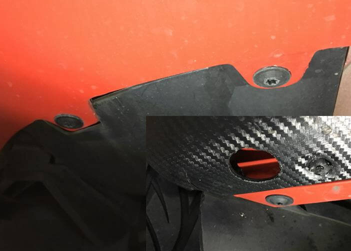Torx screw under the bumper.